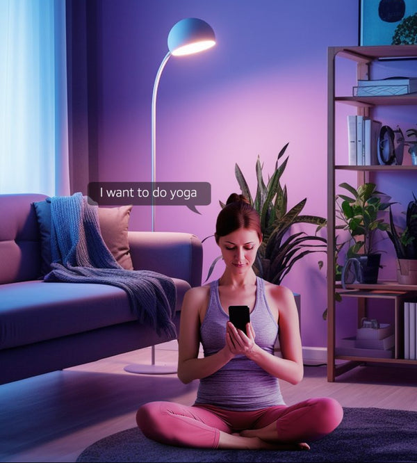 Woman in a yoga pose using a phone in a room with adjustable lighting